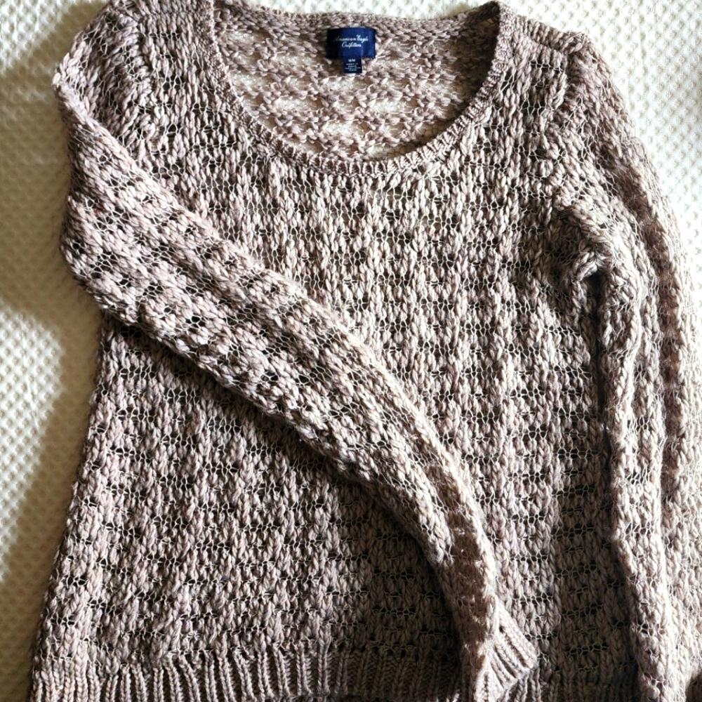 Cozy beige sweater,made for layering.